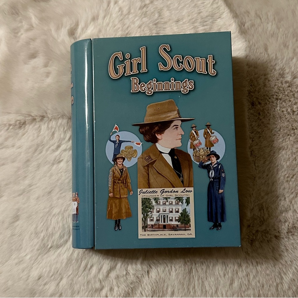 This is a vintage collectible Girl Scout Beginnings book-shaped metal tin box